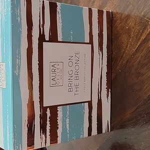 Bring on the bronzer- missing the lip gloss.